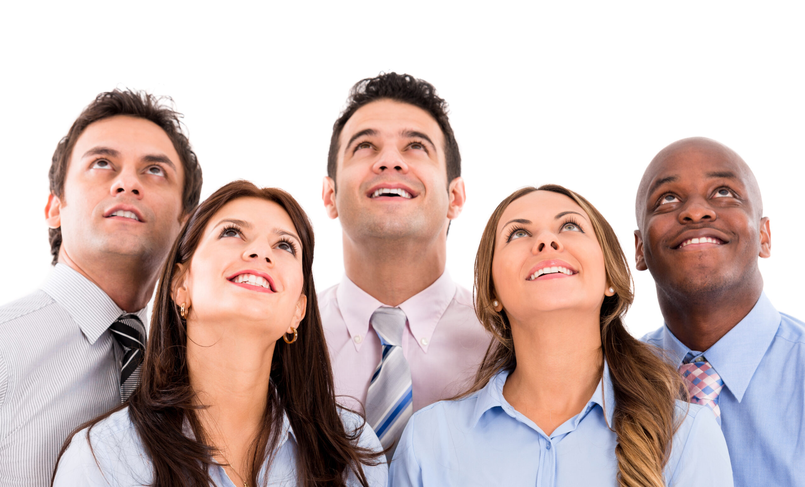 Business team looking up and smiling - isolated over White